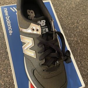 New Balance Black and Gold Athletic Shoes